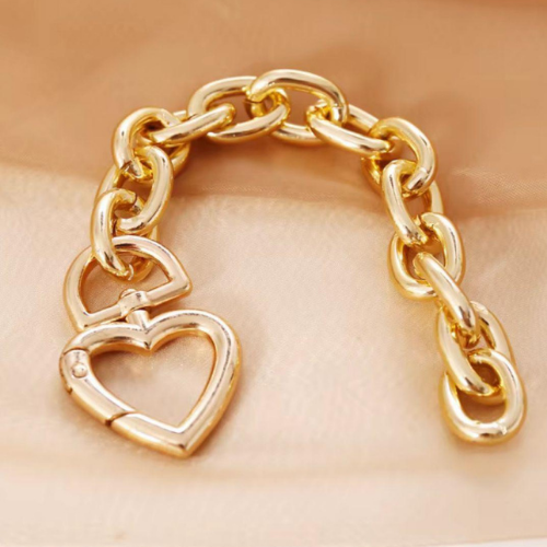 Bracciale dorato con cuore