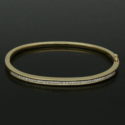 Bracciale dorato con pietre